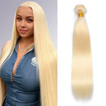 Black woman with Vinisay 613 blonde body wave bundle install